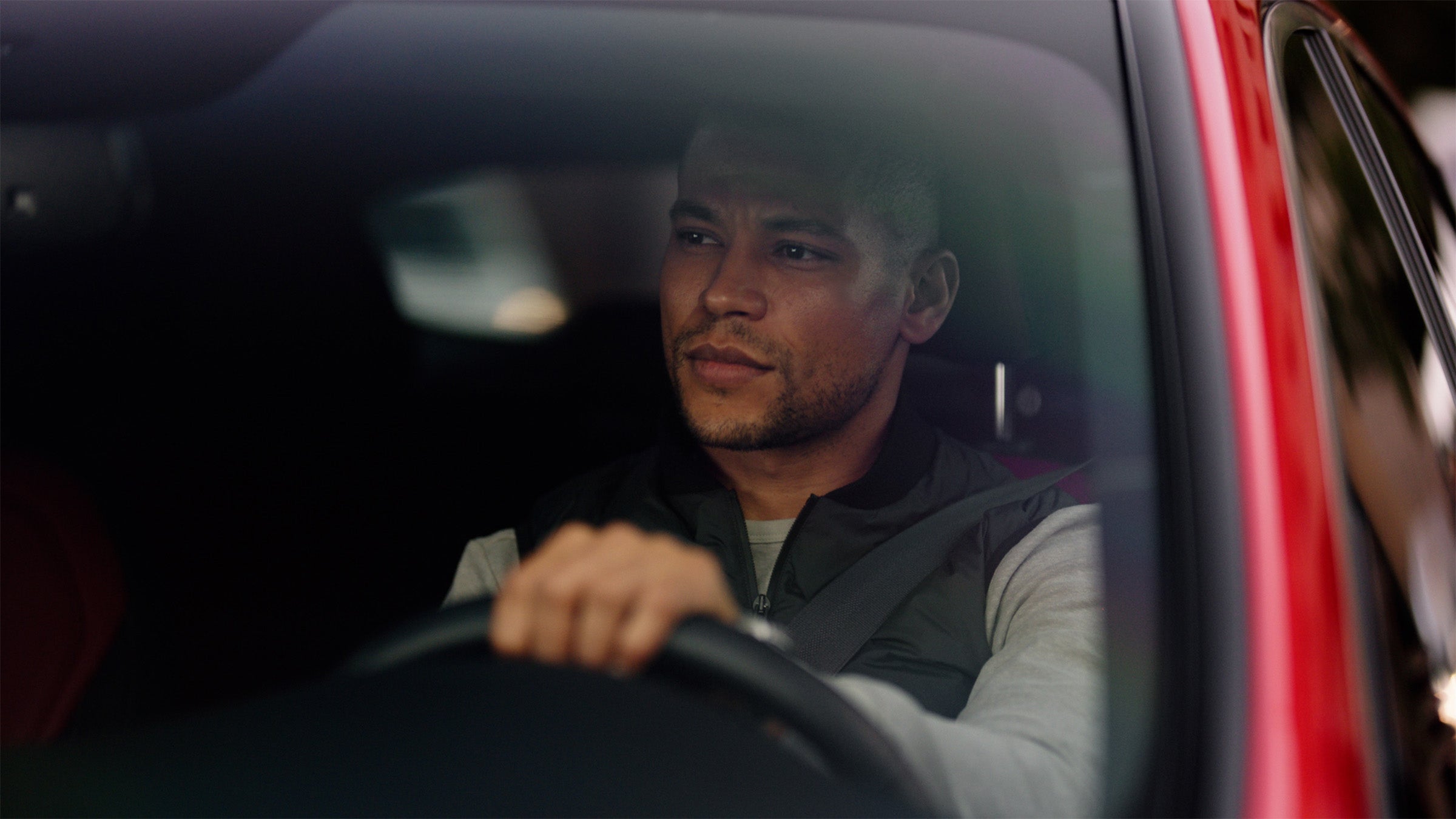 Driver in the 2024 INFINITI QX55 crossover